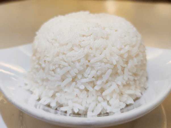 ¿Qué pasa si no sé Enjuaga el arroz?